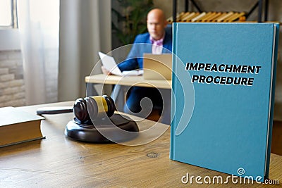 IMPEACHMENT PROCEDURE book in the hands of a attorney. ImpeachmentÂ is a complex series of steps andÂ proceduresÂ undertaken by Stock Photo